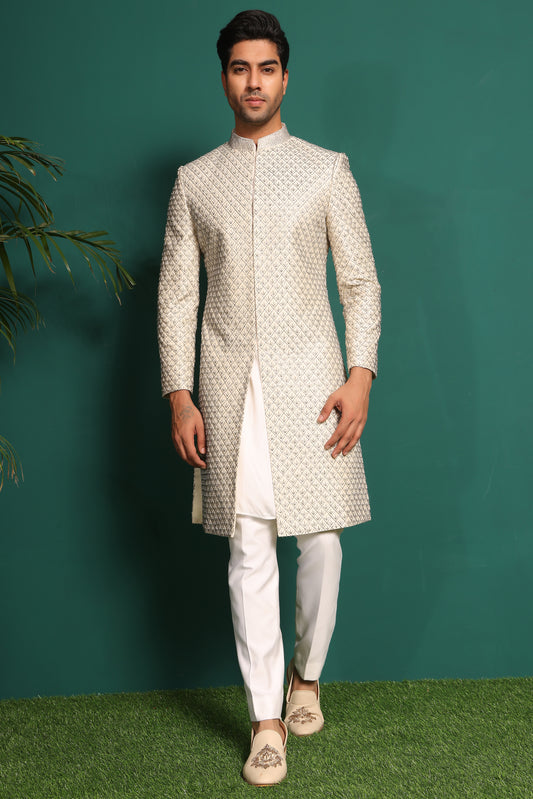 Ivory White Sherwani heavily embellished with moti and cutdaana